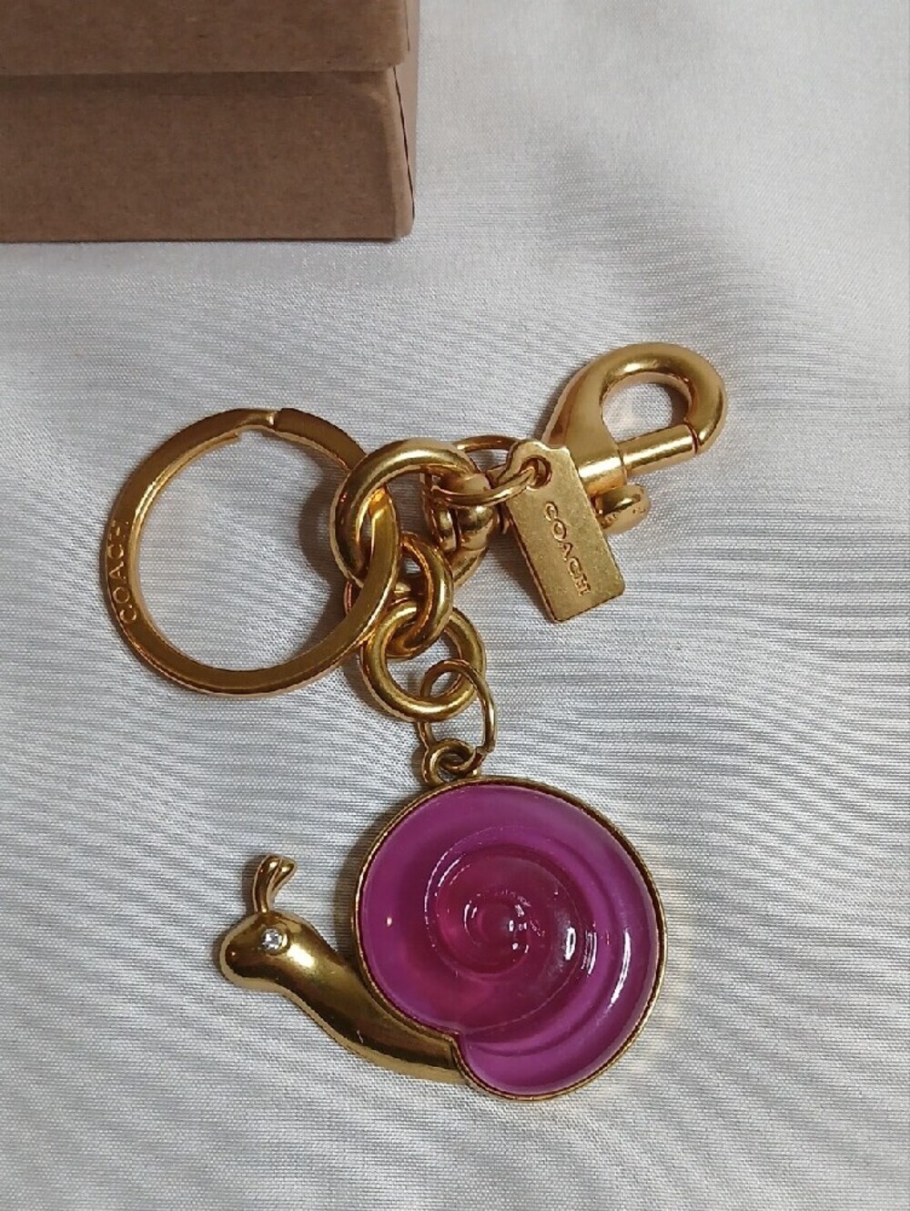 Coach Gold-Tone Purple Snail Keyring Charm - Picture 2 of 3